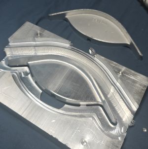 Machined aluminum end cap components and offcut